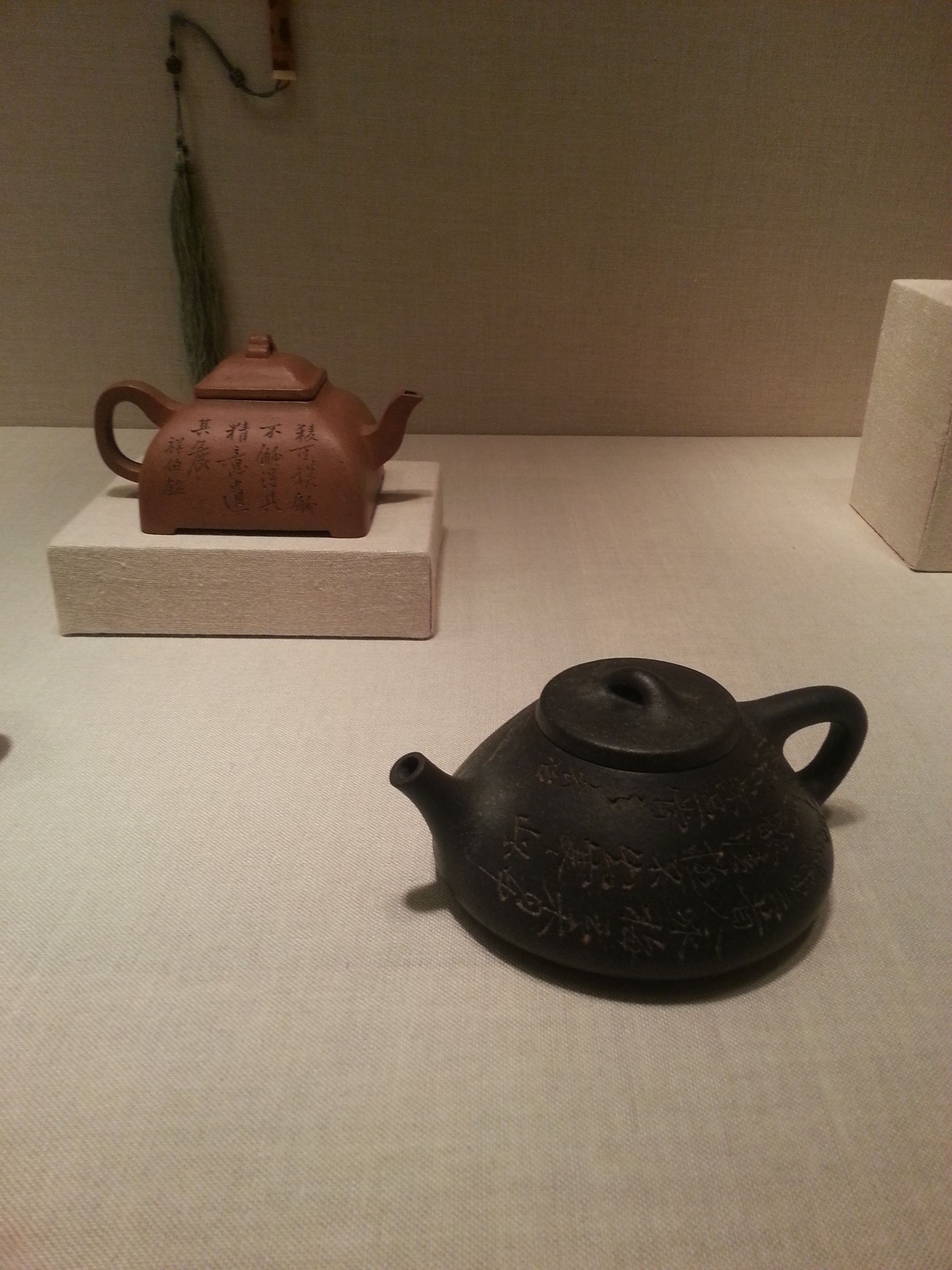 calligraphy on a teapot; flowing liquid poetry; I want more tea to speak to me